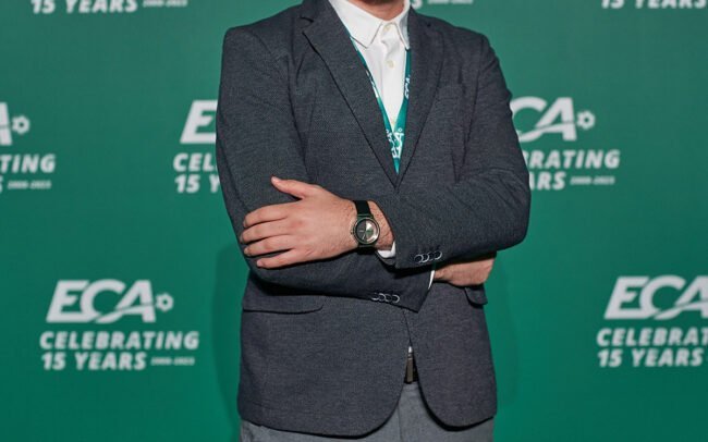 Guest having photo taken at sports gala